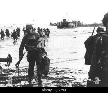 Soldiers move onto Omaha Beach during the Allied Invasion of Europe on D-Day, June 6, 1944.  /d-day  /d-day Stock Photo