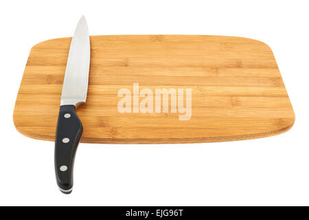 Knife over wooden cutting board Stock Photo