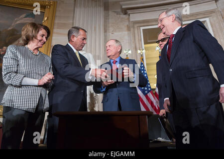 US Congressional leaders present a Congressional Gold Medal to golfer Jack Nicklaus for his promotion of excellence, good sportsmanship, and philanthropy during a ceremony March 24, 2015 in Washington, DC. From left to right: House Minority Leader Nancy Pelosi, Speaker John Boehner, Jack Nicklaus, Senate Minority Leader Harry Reid and Senate Majority Leader Mitch McConnell. Stock Photo