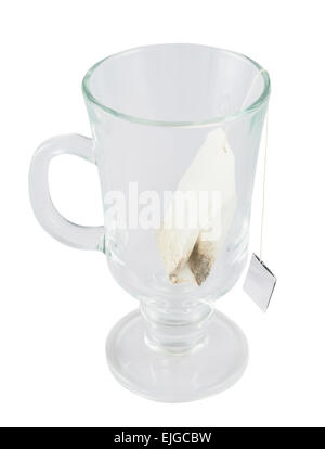 Glass teacup with a tea bag inside Stock Photo