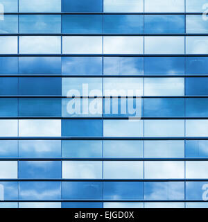 Modern office building wall made of blue glass and steel frame, square seamless photo texture Stock Photo