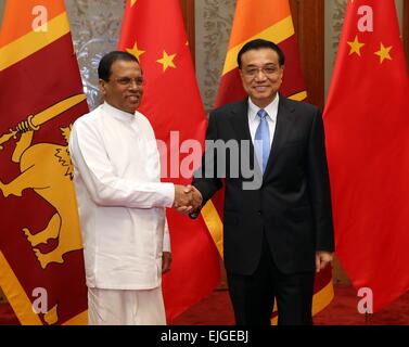 Beijing, China. 26th Mar, 2015. Chinese Premier Li Keqiang (R) meets with Sri Lanka President Maithripala Sirisena, who will also attend the annual conference of the Boao Forum for Asia, in Beijing, capital of China, March 26, 2015. © Liu Weibing/Xinhua/Alamy Live News Stock Photo