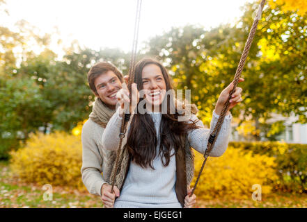 smiling couple hugging in autumn park Stock Photo