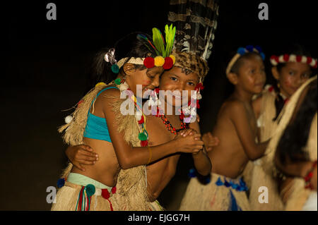 Children performing in an Amerindian dance group, Apura, Suriname Stock Photo