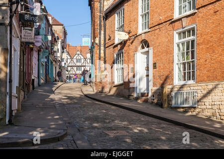 The top of Steep Hill, an historic cobbled street in Lincoln, England, UK. Stock Photo