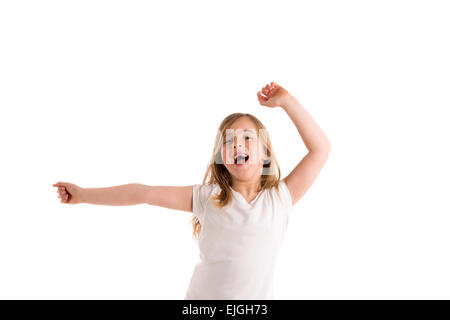 blond kid girl indented jumping high wind on hair at white background Stock Photo