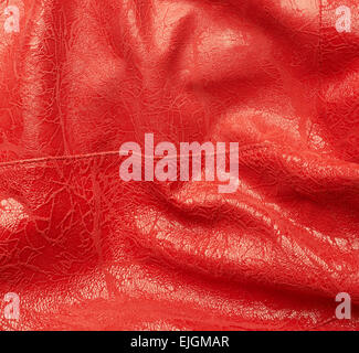 Artificial red leather material fragment Stock Photo