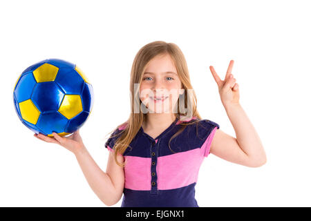 Football soccer blond kid girl happy player with ball on white background Stock Photo