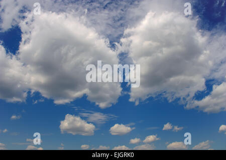 Blue sky with two big white clouds backdrop image Stock Photo
