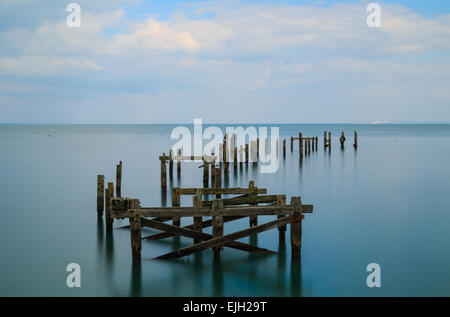 The deacaying wooden pier at Swanage in Dorset Stock Photo