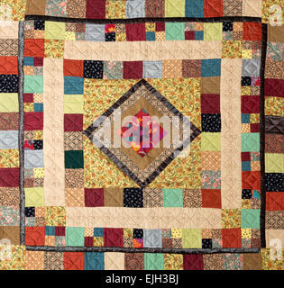 a patchwork background with different colored patterns Stock Photo