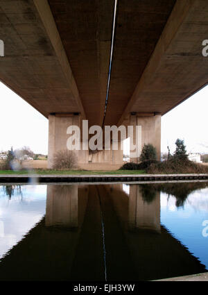 View under the M5 road bridge over the Exeter Canal, Devon, UK Stock Photo