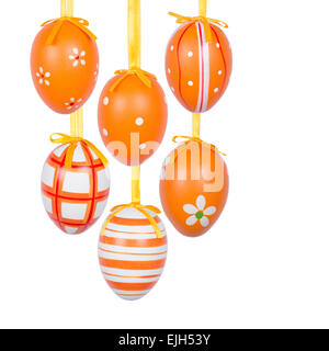Group of hanging Easter eggs on a white background Stock Photo