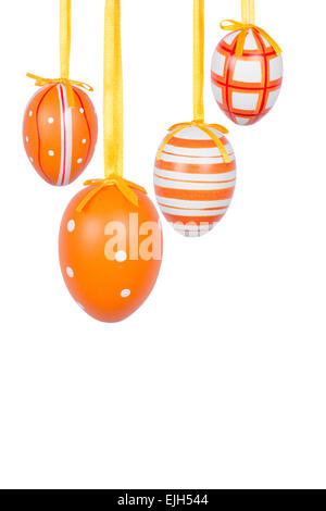 Group of hanging Easter eggs on a white background Stock Photo