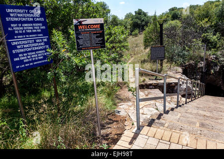 Johannesburg South Africa,Muldersdrift,Sterkfontein Caves,hominin,hominid site,human ancestor,Cradle of Humankind,cave entrance,signs,SAfri150305051 Stock Photo