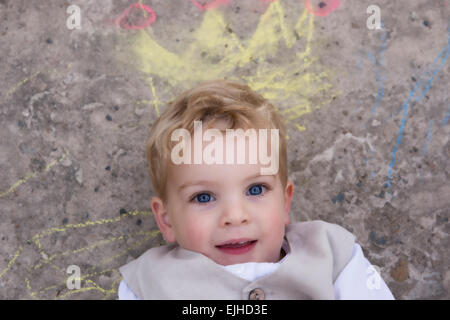 Young boy pretending to be a king Stock Photo