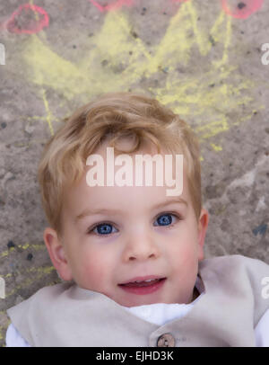 Young boy pretending to be a king Stock Photo