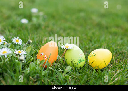 Tree colorful Easter eggs in the garden Stock Photo