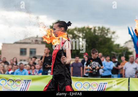 ORENBURG, ORENBURG region, RUSSIA, 25 July, 2014 year. The girls performed a dance with burning torches Stock Photo