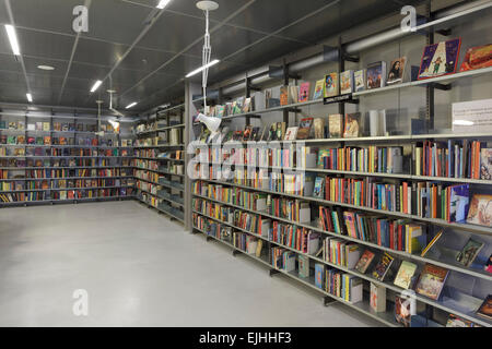 Bookcases in youth library. Rentemestervej Library, Copenhagen, Denmark. Architect: COBE, 2011. Stock Photo