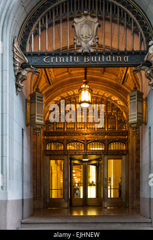 Detail of main entrance to Trinity Building on Broadway, New York City, USA Stock Photo
