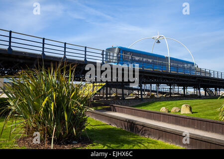 Pier railways in Southport, Merseyside UK. The north-west tourist attraction shut down after Easter in 2015. The blue Southport Pier Train, a twin-section articulated, battery-powered tram car, will be sold or dismantled. The train, which cost £300,000, was installed on the pier on July 25, 2005. The Victorian iron pier appears to be unable to withstand the train's weight. The Pier was previously closed in July 2013 due to cracks in the supports. Stock Photo