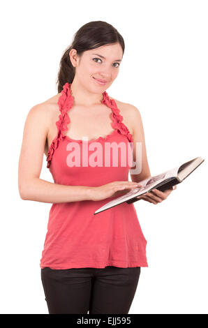 beautiful young female teacher holding book Stock Photo