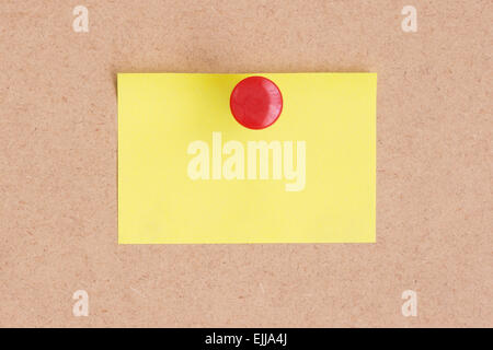 empty yellow notes on cork board Stock Photo