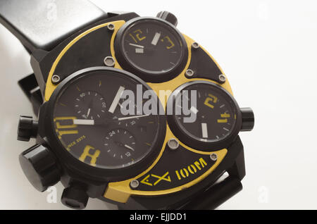 Gold and black watch isolated on white background Stock Photo