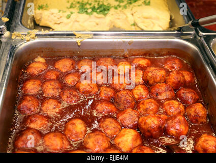 Round meatballs in tomato sauce photographed close-up Stock Photo