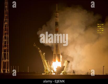 The Russian Soyuz TMA-16M rocket launches to the International Space Station carrying Expedition 43 crew members March 27, 2015 in Baikonur, Kazakhstan. NASA astronaut Scott Kelly and cosmonauts Mikhail Kornienko and Gennady Padalka are on a year long mission onboard the ISS. Stock Photo