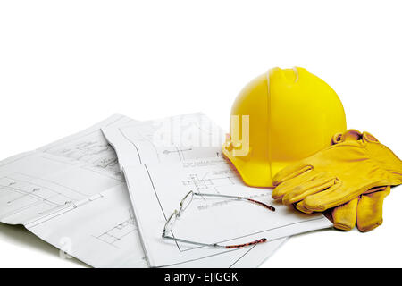 A set of blueprints with hardhat, work gloves and reading glasses isolated on white Stock Photo