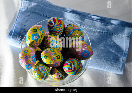 foiled Chocolate Colorful Easter Eggs in glass Stock Photo