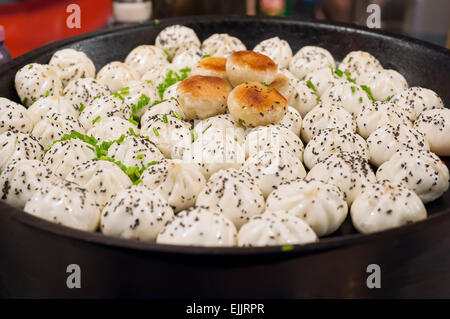 Shanghai-style pan-fried pork buns, Shanghai, China Stock Photo