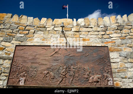 Falklands, Port Stanley, Falkland Islands flag above 1982 war victory memorial Stock Photo