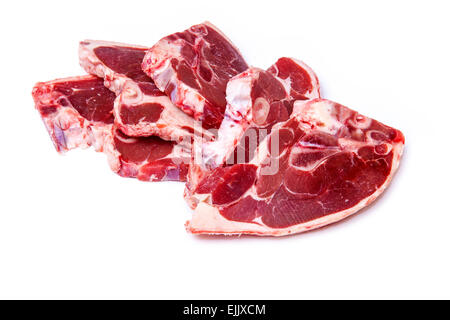 Uncooked New Zealand lamb chops isolated on a white studio background. Stock Photo