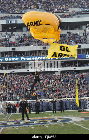 A member of the Army Golden Knights Parachute team lands on the Lincoln Financial Field stadium in Philadelphia, Pa., during the pregame show of the 2010 Army Navy football game on Dec. 11, 2010. U.S. Army  Mr. Leroy Council Stock Photo