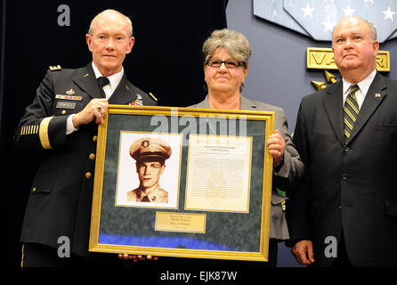 Chief of Staff of the Army Gen. Martin Dempsey presents the Hall of Heroes induction plaque to Silvia Svehla, sister of Korean War Medal of Honor recipient Army Private 1st Class Henry Svehla, during a ceremony at the Pentagon, May 3, 2011.  Defense Department photo by Cherie Cullen  /medalofhonor/?ref=home-spot0-title  /medalofhonor/?ref=home-spot0-title Stock Photo