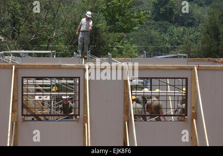 U.S. Soldiers and U.S. Marines help Honduran contractors construct new facilities at the Juan Ramon Molina School in Marcala, Honduras, April 29, 2008. The project is part of Beyond the Horizons, a joint training exercise wherein U.S. Army Reserve and National Guard Soldiers conduct humanitarian and civil assistance missions while developing their engineering, construction and medical skills.  1st Lt. Ryan Hanna/ Stock Photo