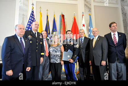 From Left, Hon. Joseph Westphal, Under Secretary of the Army and U.S. Army Gen. Raymond T. Odierno, 38th Chief of Staff of the Army, U.S. Senator Tom Udall, Mrs. Ashley Petry, Sgt. 1st Class Leroy A. Petry, U.S. Senator Jeff Bingaman,  U.S. Congressmen Steve Pearce and Martin Heinrich stand for a group photo during the presentation of a resolution by the New Mexico delegation to Petry Sept. 13, 2011 at the Capitol in Washington D.C.  Staff Sgt. Teddy Wade Stock Photo