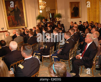 U.S. Army Rangers from the 75th Ranger Regiment attend the Medal of Honor presentation for Sgt. 1st Class Leroy A. Petry at the White House, July 12. Petry received the Medal of Honor for his actions during a mission on May 26, 2008, serving as a squad leader with Delta Company, 2nd Battalion, 75th Ranger Regiment while conducting a mission in rural eastern Afghanistan with his unit to capture a high-value insurgent target. Early in the mission, the squad came under heavy enemy fire and Petry was shot in both legs. Despite his wounds, the Ranger gallantly continued fighting alongside his broth Stock Photo