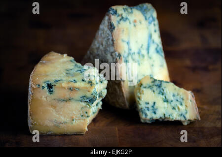 Stilton mature blue mouldy cheese - Dark background Stock Photo