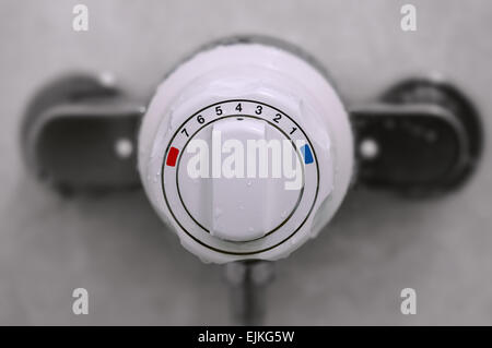 Shower thermostatic power and heat controller close up Stock Photo