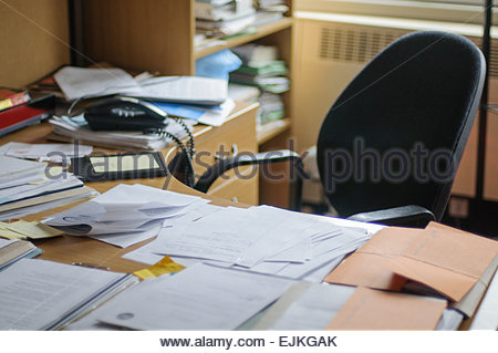 A messy desk with lots of paperwork Stock Photo: 7639976 - Alamy