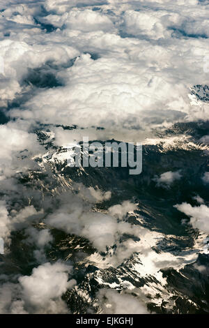 Above aerial plane view of Italian alps and cloudscape Stock Photo - Alamy
