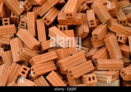 beautiful pile of red bricks prepair for built the house Stock Photo