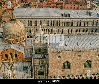 Venice, Province of Venice, ITALY. 6th Oct, 2004. At left is one of the four smaller domes, flanking the large central dome of The Patriarchal Cathedral Basilica of Saint Mark in Venice viewed from atop the Campanile di San Marco (bell tower) in Piazza San Marco. At center and right is part of the Doges Palace. Venice is one of the most popular international tourist destinations © Arnold Drapkin/ZUMA Wire/Alamy Live News Stock Photo
