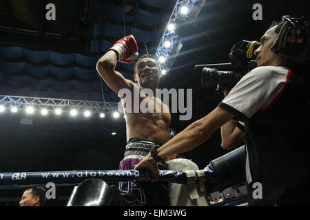 Manila, Philippines. 28th Mar, 2015. Donnie Nietes of the Philippines rejoices after defeating Gilberto Parra of Mexico in their WBO World Jr. Flyweight Championship bout at the Araneta Coliseum on Saturday. © Mark Cristino/Pacific Press/Alamy Live News Stock Photo