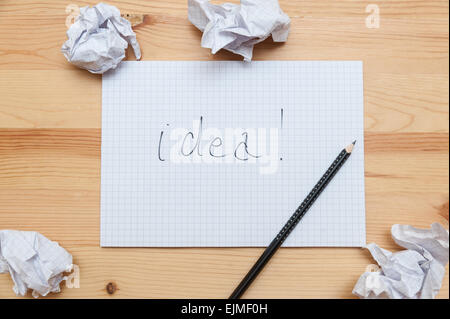 Blank notepad with pencil on wooden desk Stock Photo
