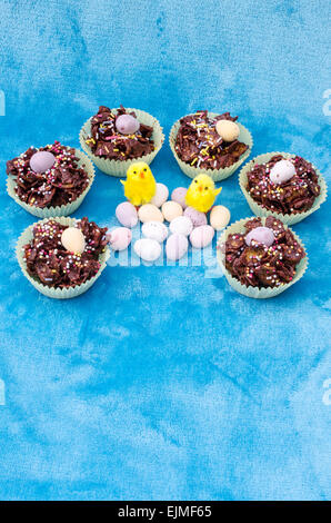 Circle of tasty Easter treats. Vertical. Copy Space. Stock Photo